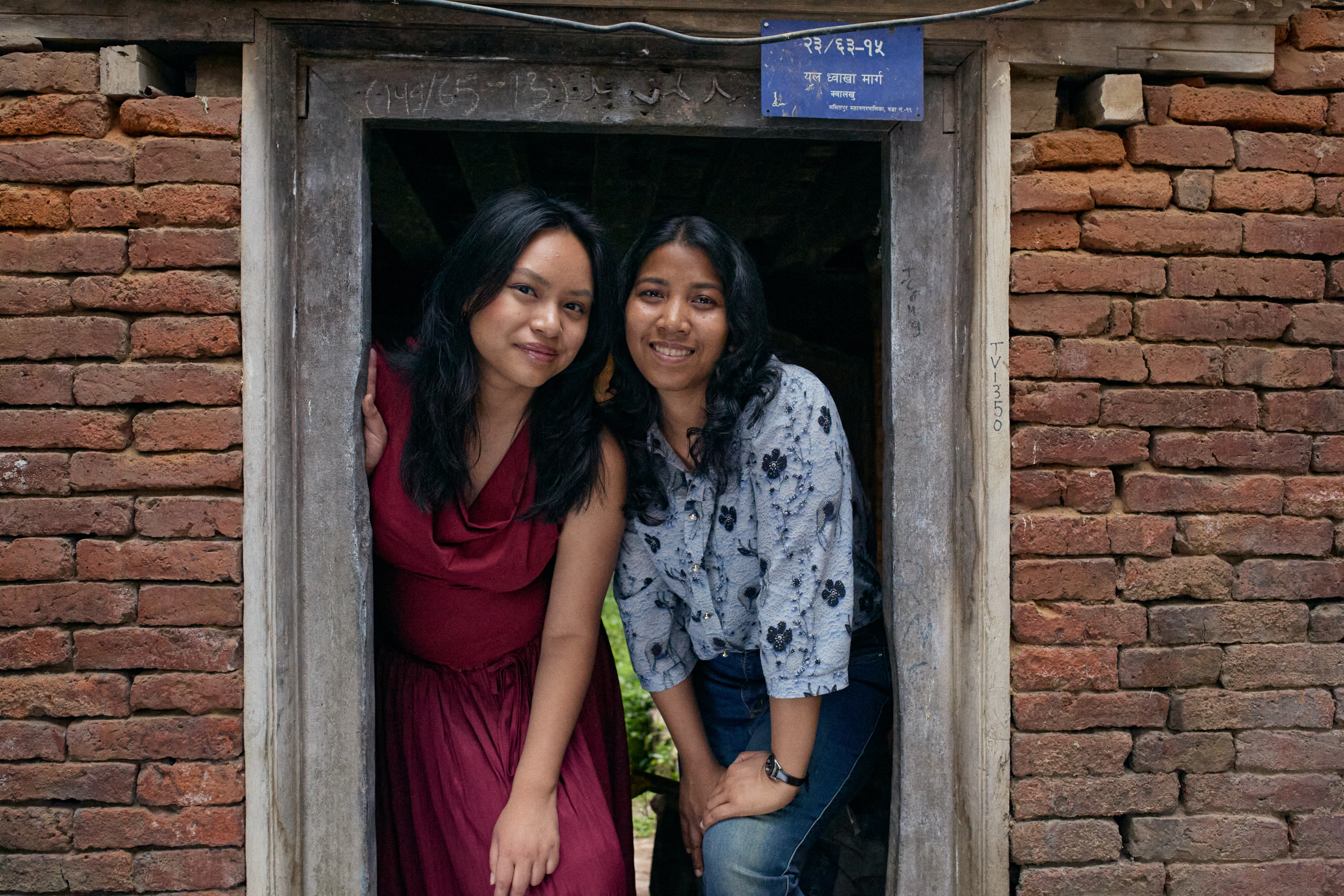 Two women in a doorway in Nepal